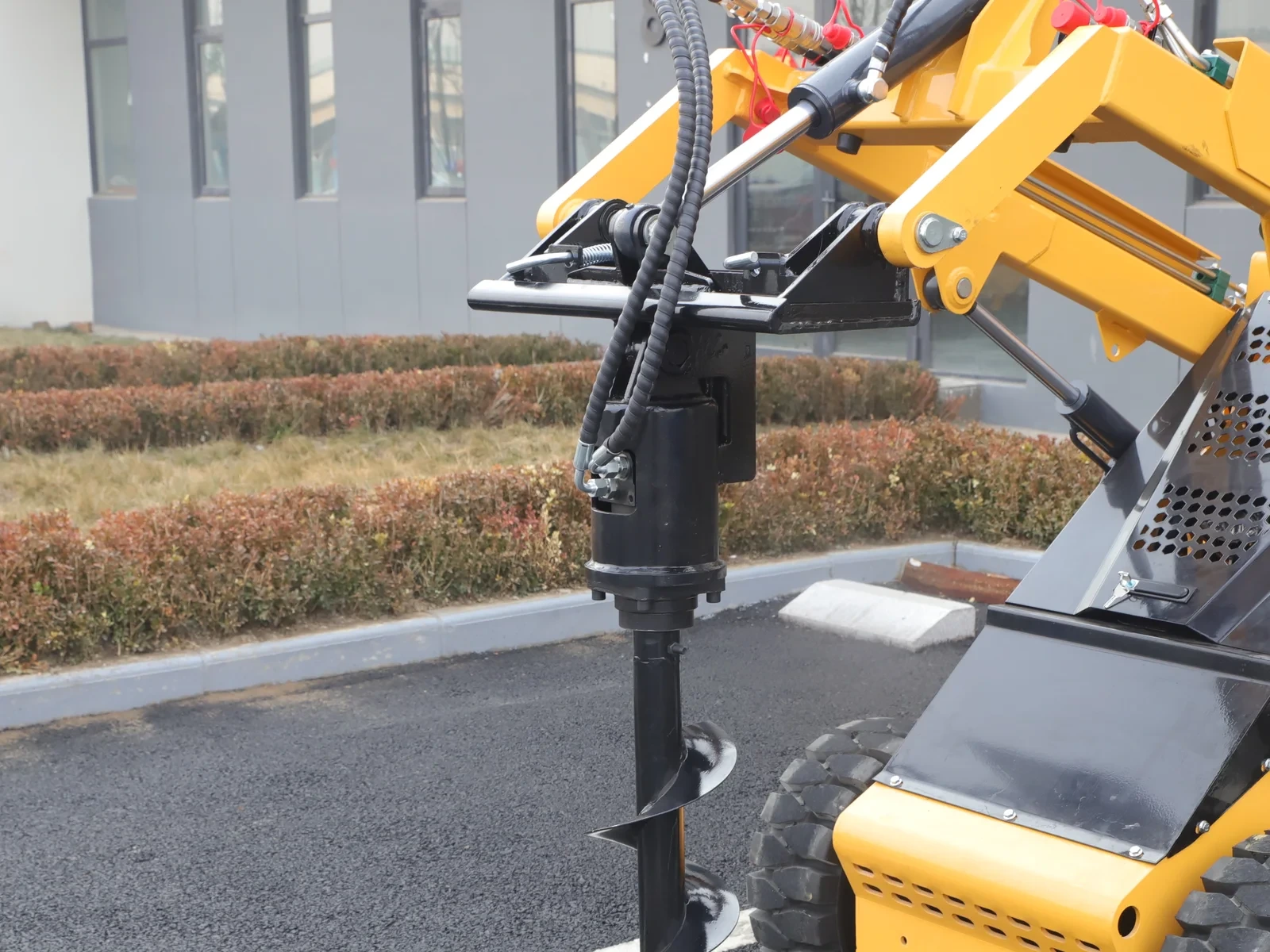 Skid Steer Auger mounted carrier view