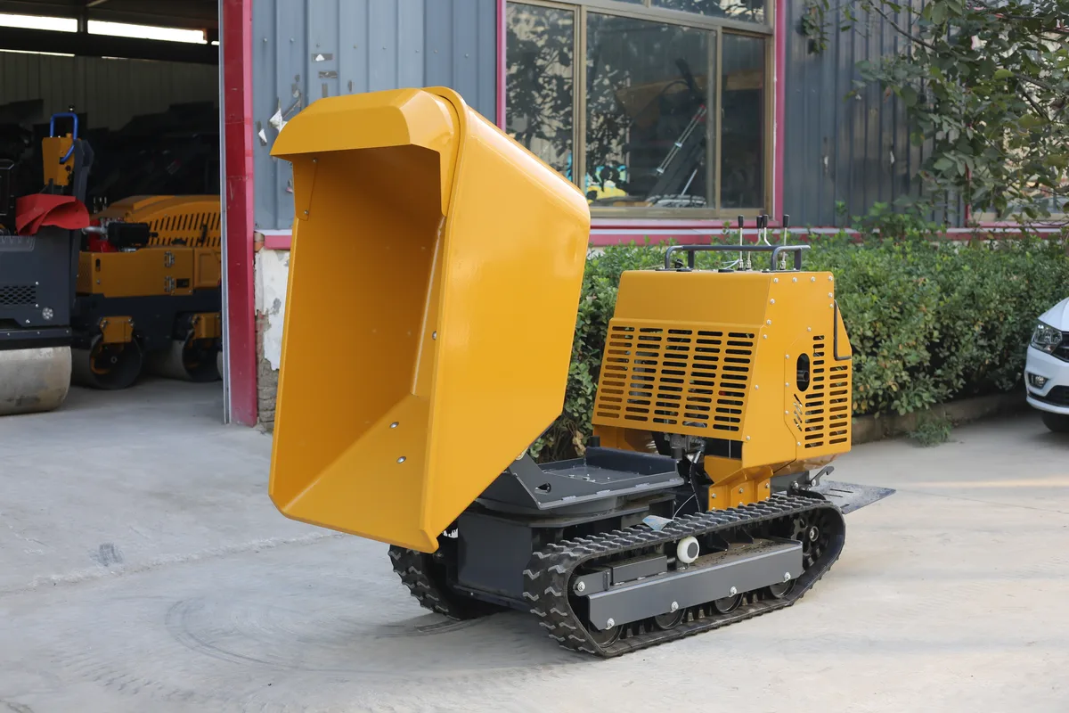 TerraCub PIVOT 1200 — rear left view with dump bucket raised showing rotary dump base mechanism