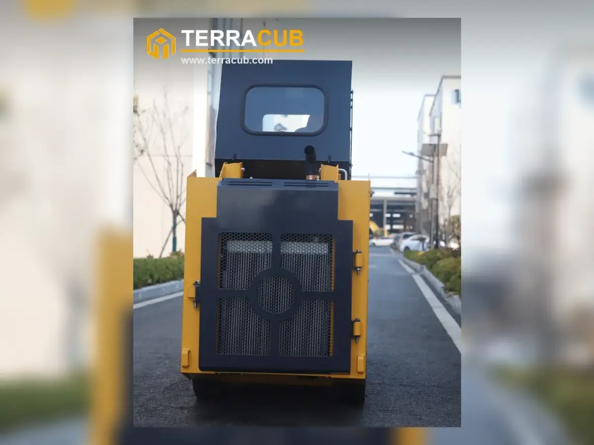 TerraCub S55 skid steer loader rear view with enclosed cab and counterweight body