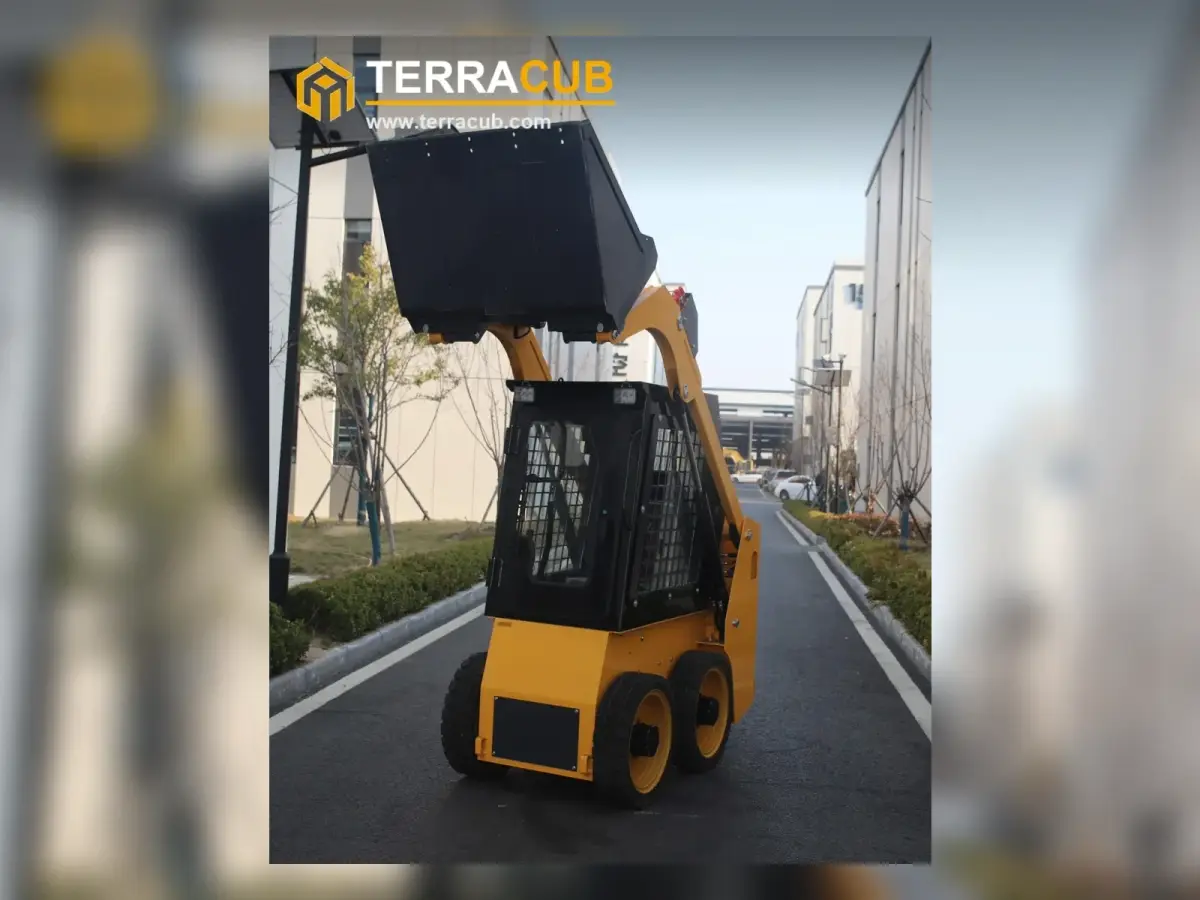TerraCub S55 skid steer loader with bucket raised for truck or hopper loading